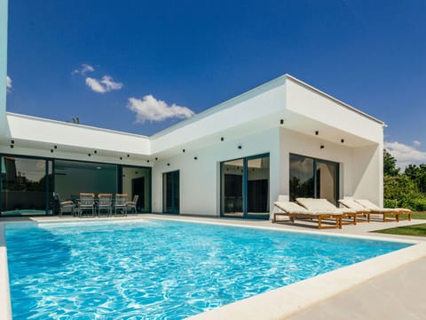 Water, Sky, Property, Swimming Pool, Azure, Shade, Cloud, Leisure, Building, Composite Material
