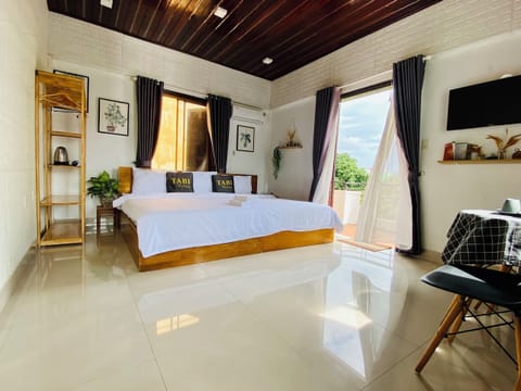 Deluxe Double Room, Balcony | Desk, laptop workspace, iron/ironing board