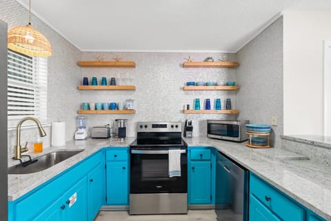 Colorful kitchen with all you will need to make great meals.