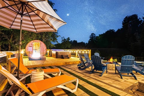 Cozy fire pit area perfect for evening gatherings under the stars, paired with a private cedar sauna for ultimate relaxation and mountain vibes.
