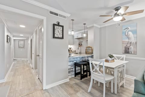 Charming dining area with a cozy table setup for a delightful meal experience.