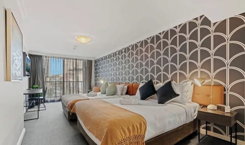 Cozy beds are ready to ensure a restful stay.