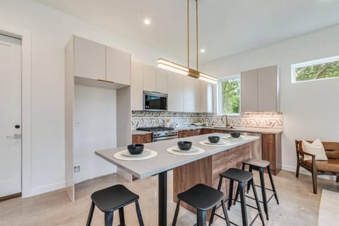 A spacious kitchen island, perfect for meal prep or casual gatherings.