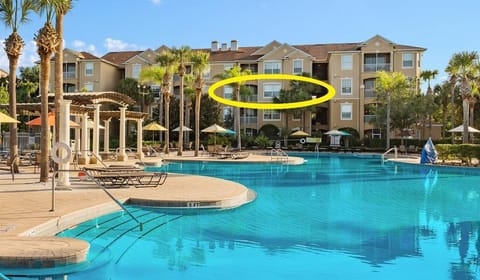 Relax and unwind with a stunning pool view from our third-floor condo at Windsor