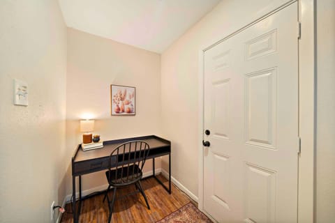 Workspace Retreat: Sleek desk and soft lighting create your perfect productivity corner!