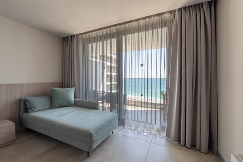 Deluxe Double Room, Balcony, Sea View | Minibar, in-room safe, desk, laptop workspace