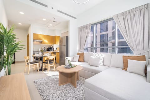 Deluxe Apartment, City View | Living area | 55-inch Smart TV with cable channels