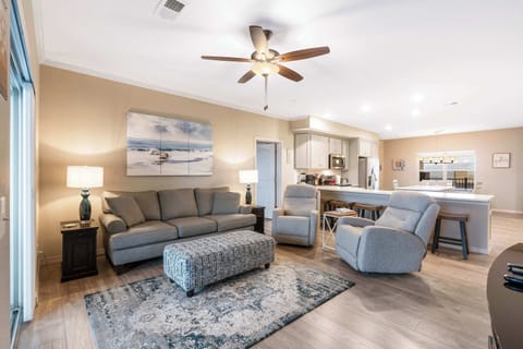 Curl up in the inviting living room & stream your favorites by the fireplace