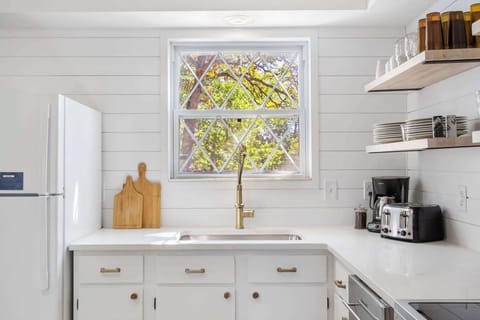 Unit 41: The bright, airy kitchen offers ample space & all the comforts of home