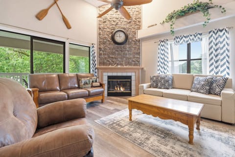 Queen sleeper sofa sleeps up to 2 guests. Electric fireplace accessible for use