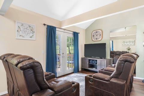 Curl up in the airy living room & stream your favorites on the smart TV