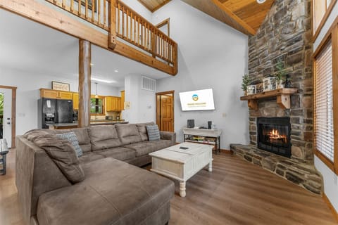 Living area with TV and fireplace