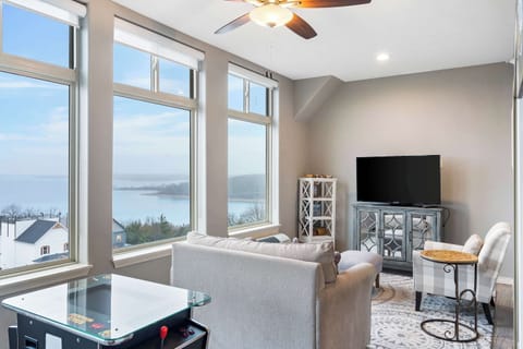 The sunroom offers a picturesque backdrop for enjoying movies & gaming