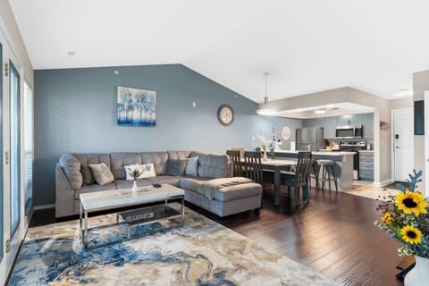 Curl up in the airy living room & stream your favorites on the smart TV
