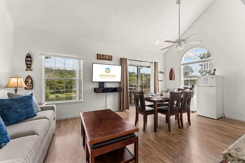 Curl up in the open living room & enjoy a movie with gorgeous water views