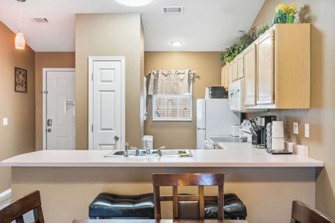 Sip morning coffee or grab a bite at the kitchen counter, with seating for 2