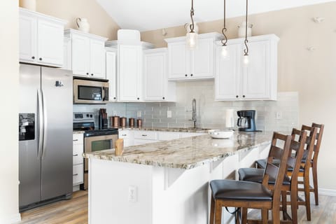 Kitchen bar counter with seating for 3