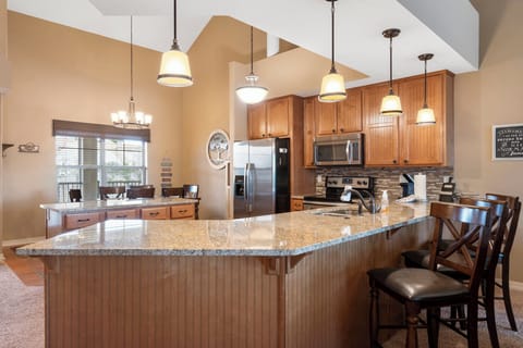 Kitchen bar counter with seating for 3