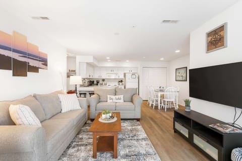 Open living space with comfy seating and, Smart TV