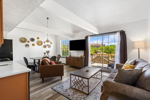 Living, dining, and kitchen area