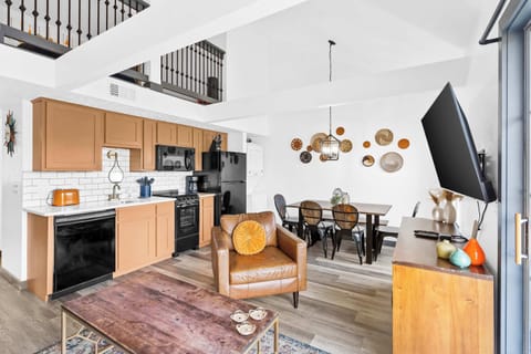 Living, dining, and kitchen area