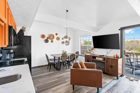 Living, dining, and kitchen area