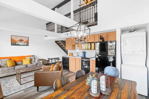 Living, dining, and kitchen area