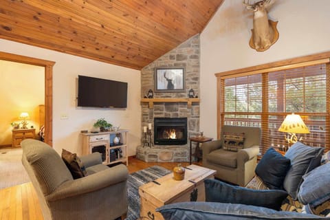 Unwind in the inviting living room & enjoy a cozy movie night at home