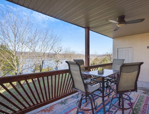 Beautiful lake view from back deck with outdoor seating