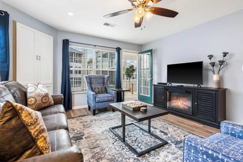Curl up in the serene living room & enjoy a movie night at home