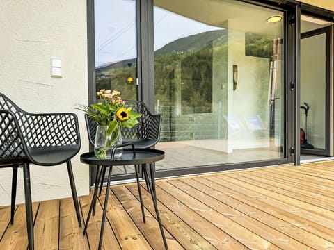 Plant, Flower, Building, Window, Furniture, Rectangle, Wood, Interior Design, Shade, Door