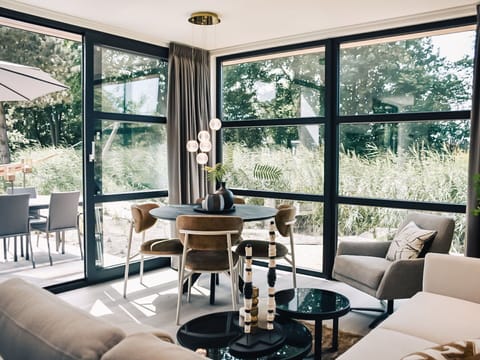 Furniture, Property, Table, Plant, Window, Shade, Interior Design, Couch, Lighting, Wood