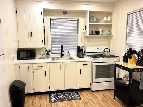 KITCHEN: Newly-remodeled kitchen with all appliances except for a dishwasher.