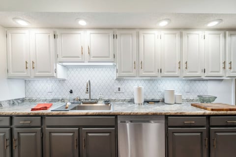 The kitchen has plenty of counter space for multiple people to cook at once.
