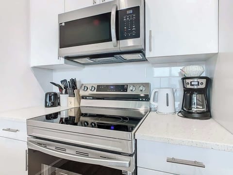 A fully stocked kitchen with all the essentials, ready for you to whip up delicious meals.