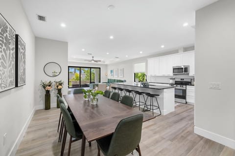 The Dining Room and Kitchen have complimenting designs and plenty of seating.