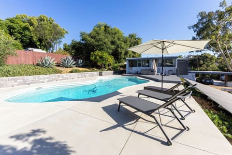 Enjoy our spacious 20,000-gallon pool and adjacent  jacuzzi on the deck. Perfect for both leisurely dips and lap swimming, the pool is conveniently located just steps from the house and offers exceptional privacy. We provide pool toys and umbrellas for your enjoyment, and our pool is professionally maintained weekly. While not heated, it naturally reaches a comfortable temperat...
