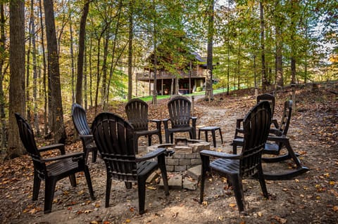 Private fire pit surrounded by peaceful wooded seclusion
