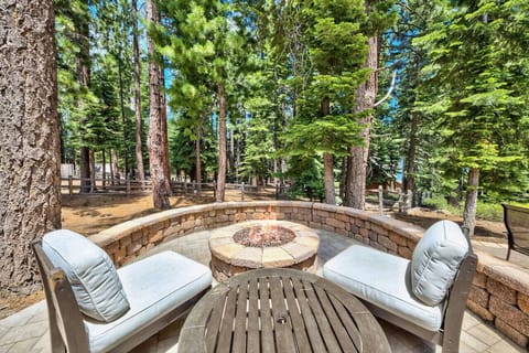 Fire Pit Retreat: Gather around the fire pit surrounded by towering pines for unforgettable evenings!