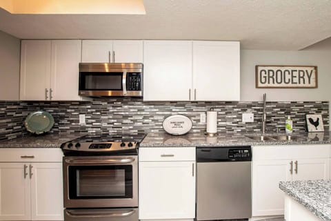 Feel at home with granite counters and stainless appliances!