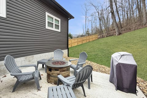 Enjoy the firepit just steps outside the house on the way to the pond and gazebo