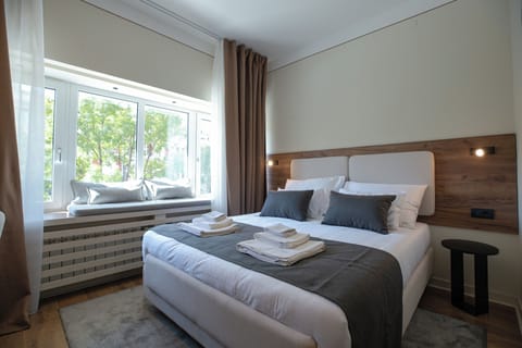 Economy Double Room, City View | In-room safe, desk, blackout drapes, soundproofing
