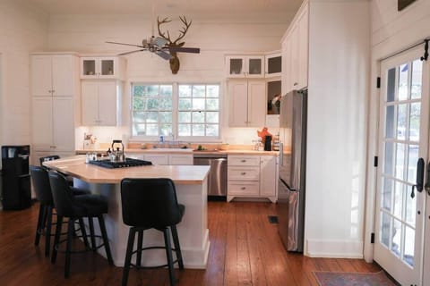 Main house kitchen with barstool seating for 4