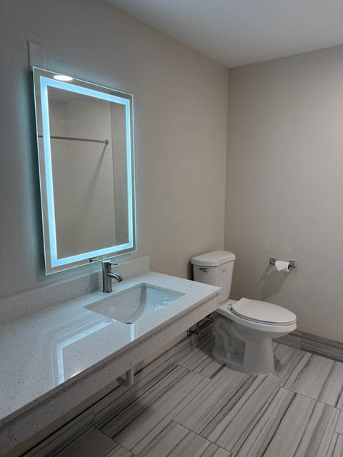 Room, 2 Queen Beds | Bathroom | Shower, towels, soap, shampoo