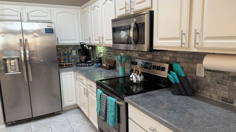 Extra large chef's kitchen with plenty of space for entertaining. 