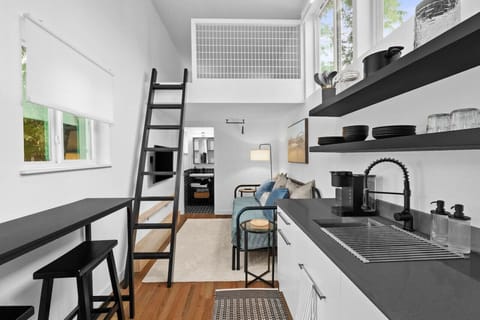Spacious open floor plan with great natural light; overhead fan to ensure you stay cool in the loft!