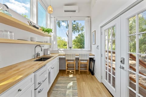 Spacious open floor plan with great natural light; overhead fan to ensure you stay cool in the loft!
