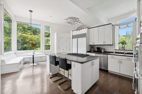 Open concept kitchen with all the appliances you`d need to make a home cooked meal