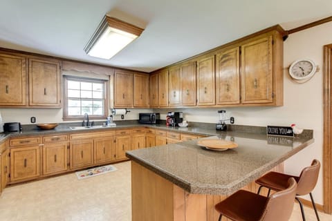 The kitchen has plenty of cabinet space.