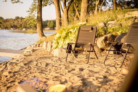 Private beach on Lake Latoka - we provide 4 beach chairs and a few beach toys